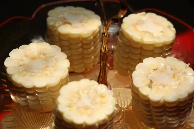 Pearl White sweet corn cut into cob sections, ready for quick-freezing